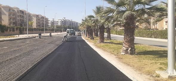 أجهزة المدن الجديدة تواصل أعمال تطوير ورفع كفاءة الطرق والمحاور